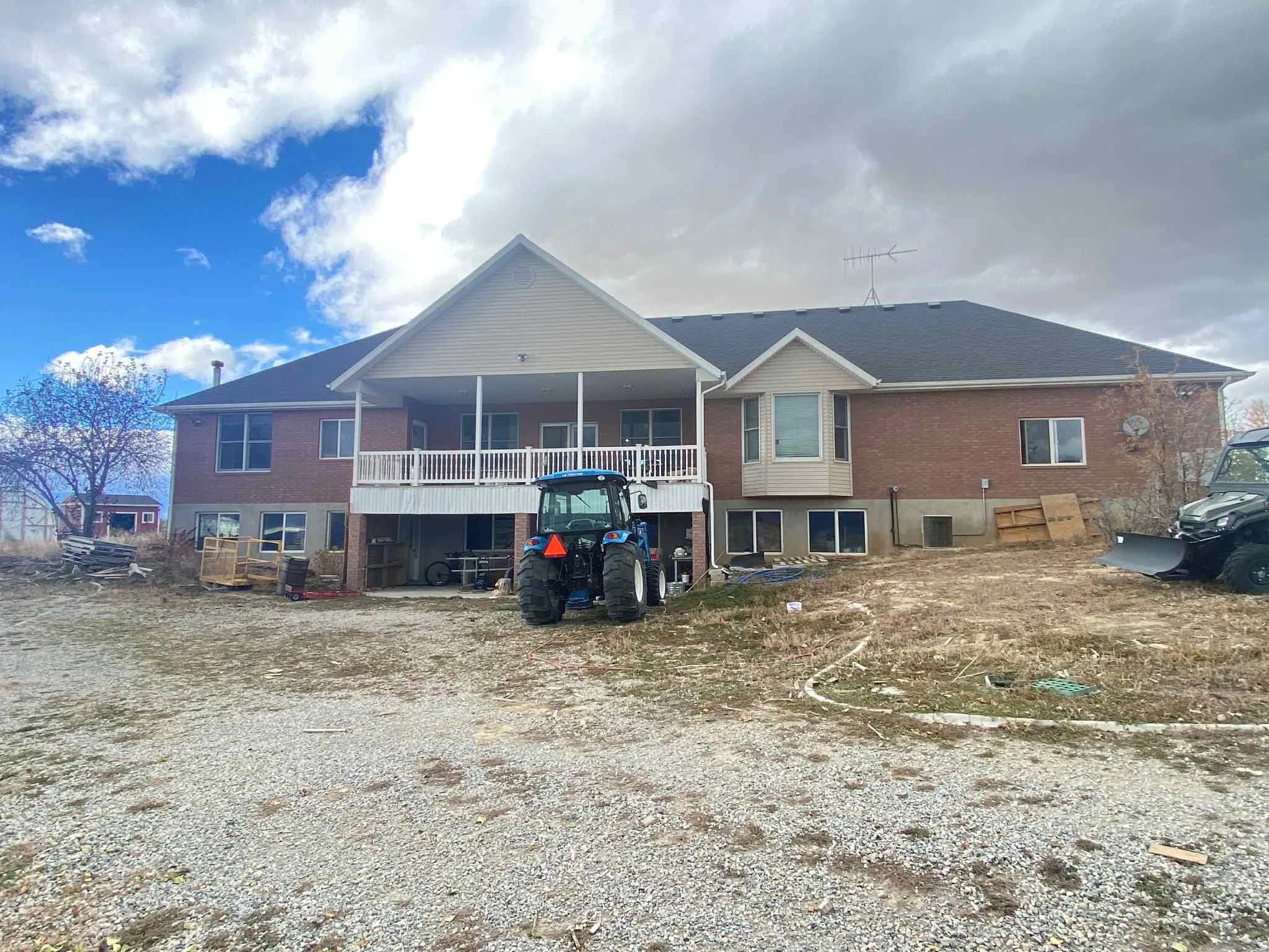 Back of property with a patio