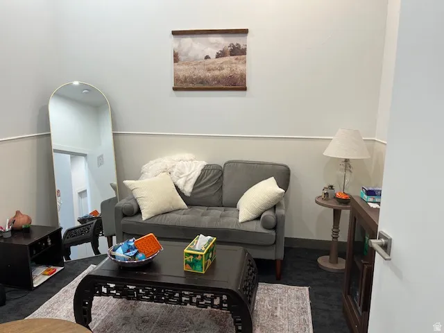 Living room featuring baseboards