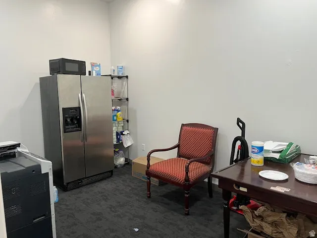 Office with dark colored carpet