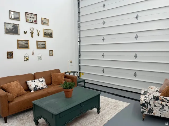 Living room with concrete flooring