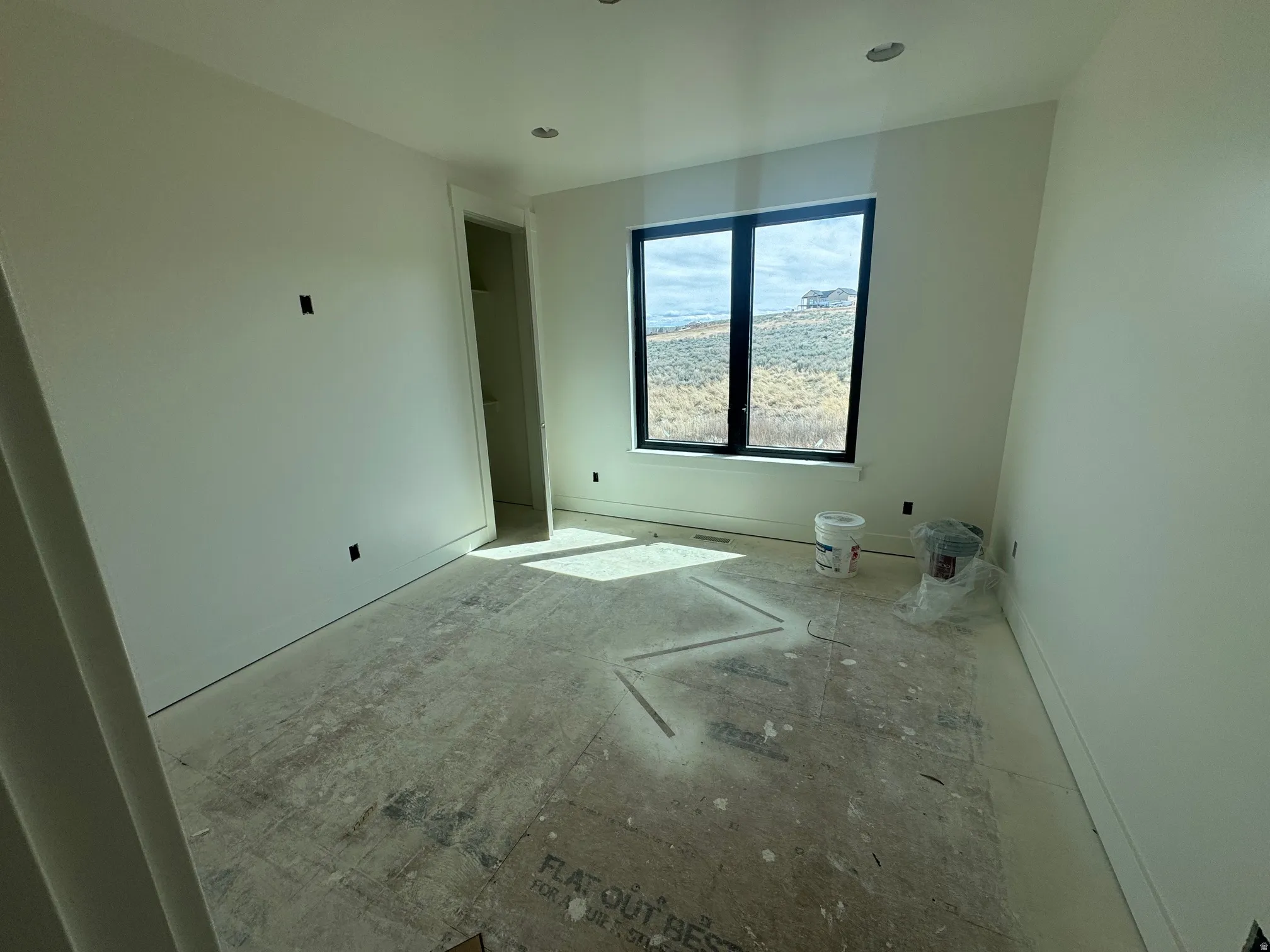 Unfurnished bedroom featuring baseboards