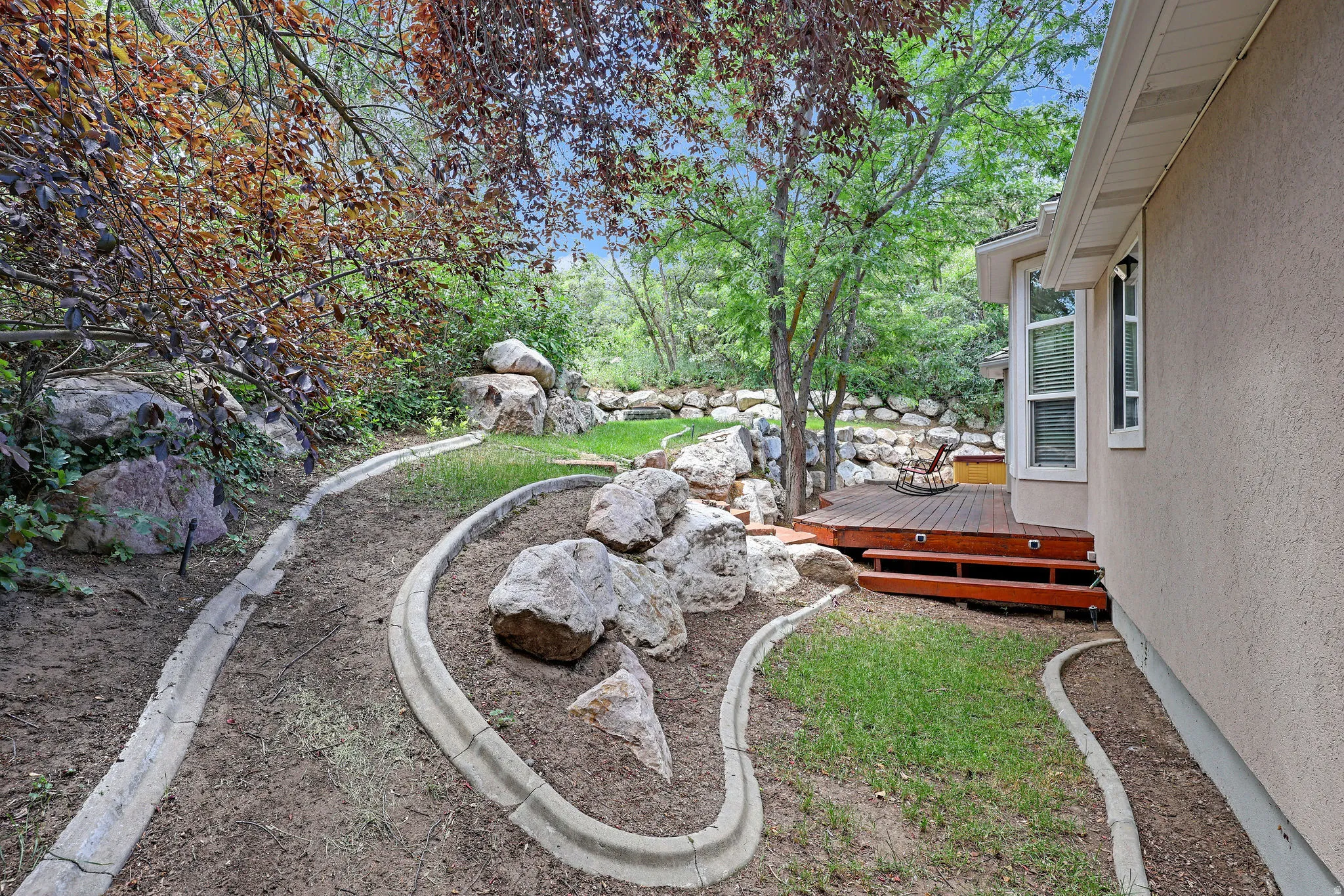 View of yard featuring a deck