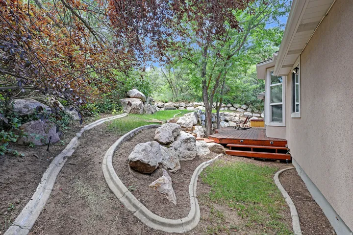 View of yard featuring a deck