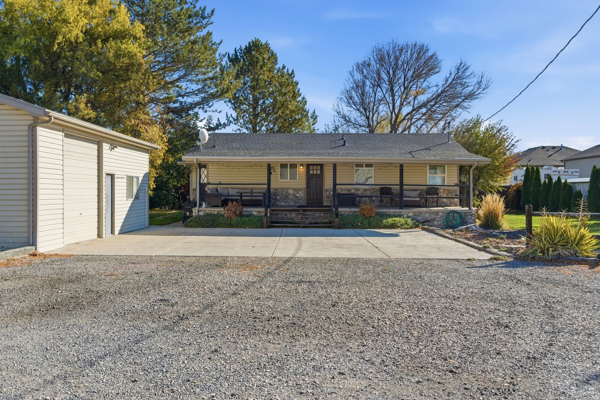 Rambler/Ranch style home with detached garage and office space
