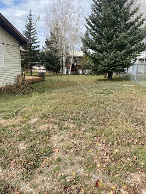 View of yard with a deck