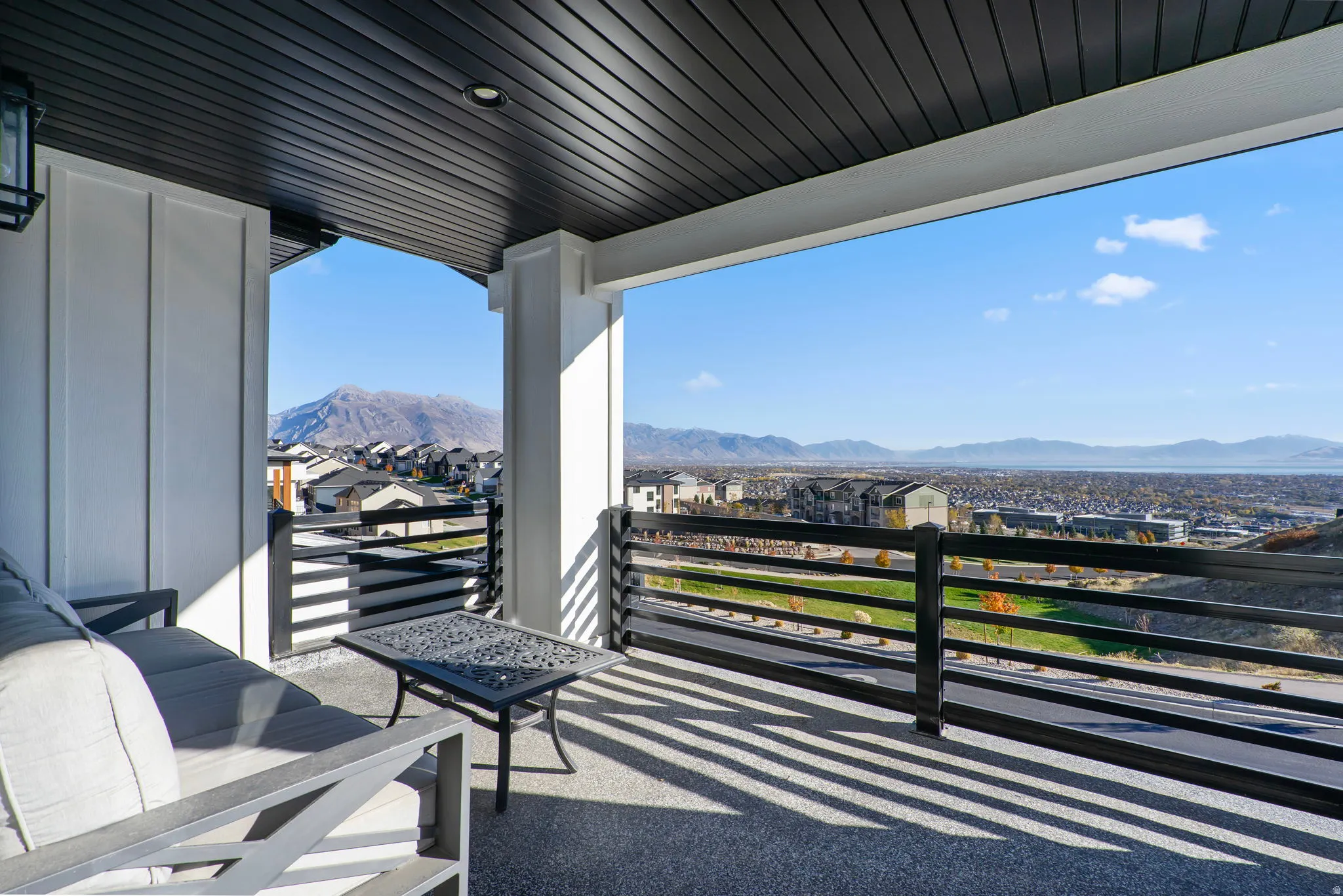 Balcony featuring a mountain view and a residential view