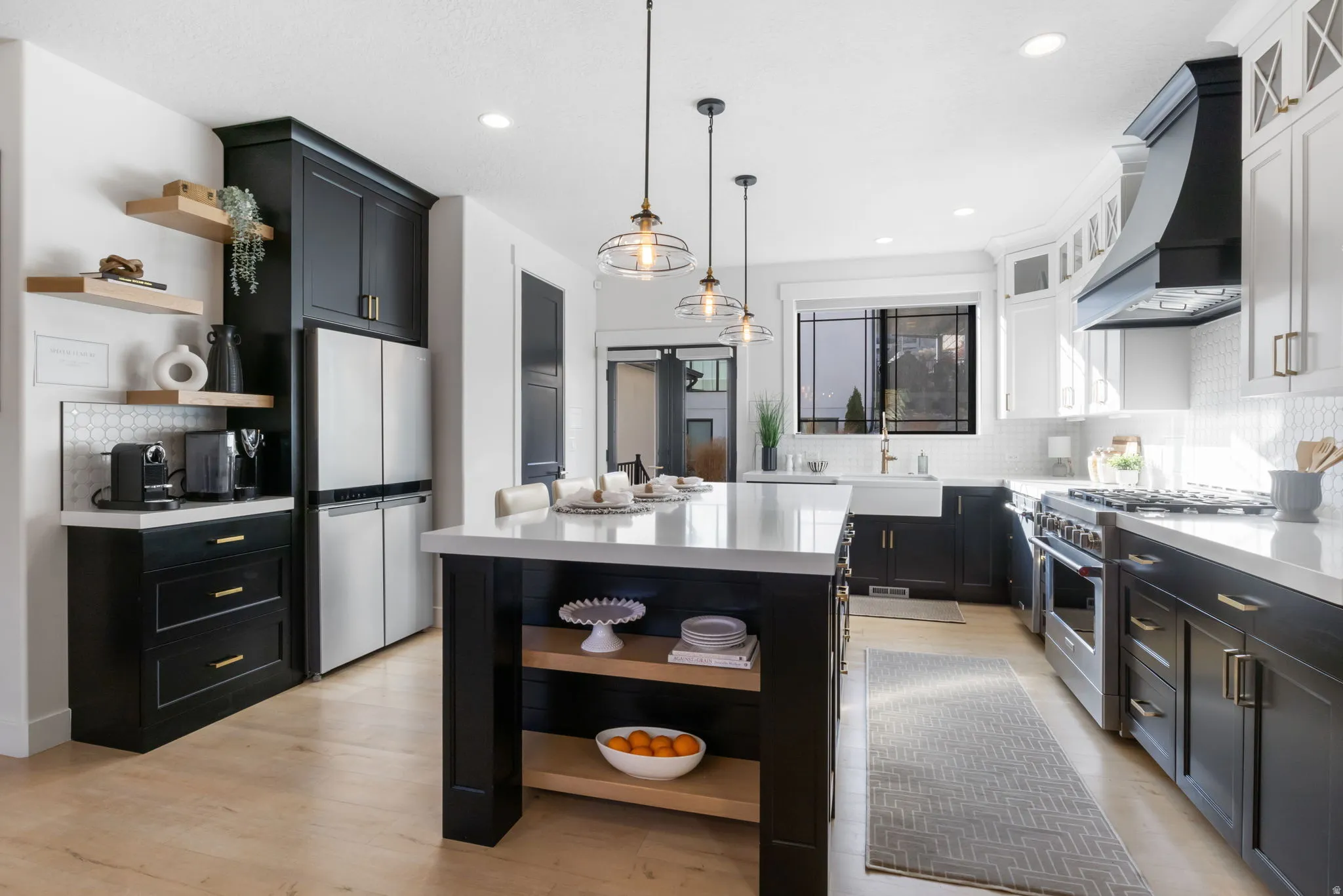 Kitchen featuring open shelves, dark cabinets, tasteful backsplash, hanging light fixtures, and recessed lighting
