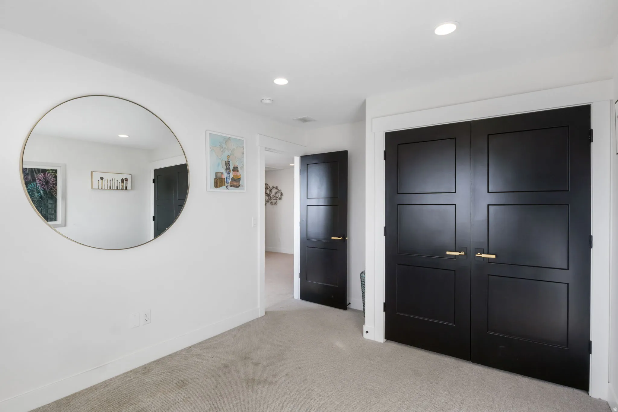 Unfurnished bedroom with recessed lighting, light colored carpet, and a closet
