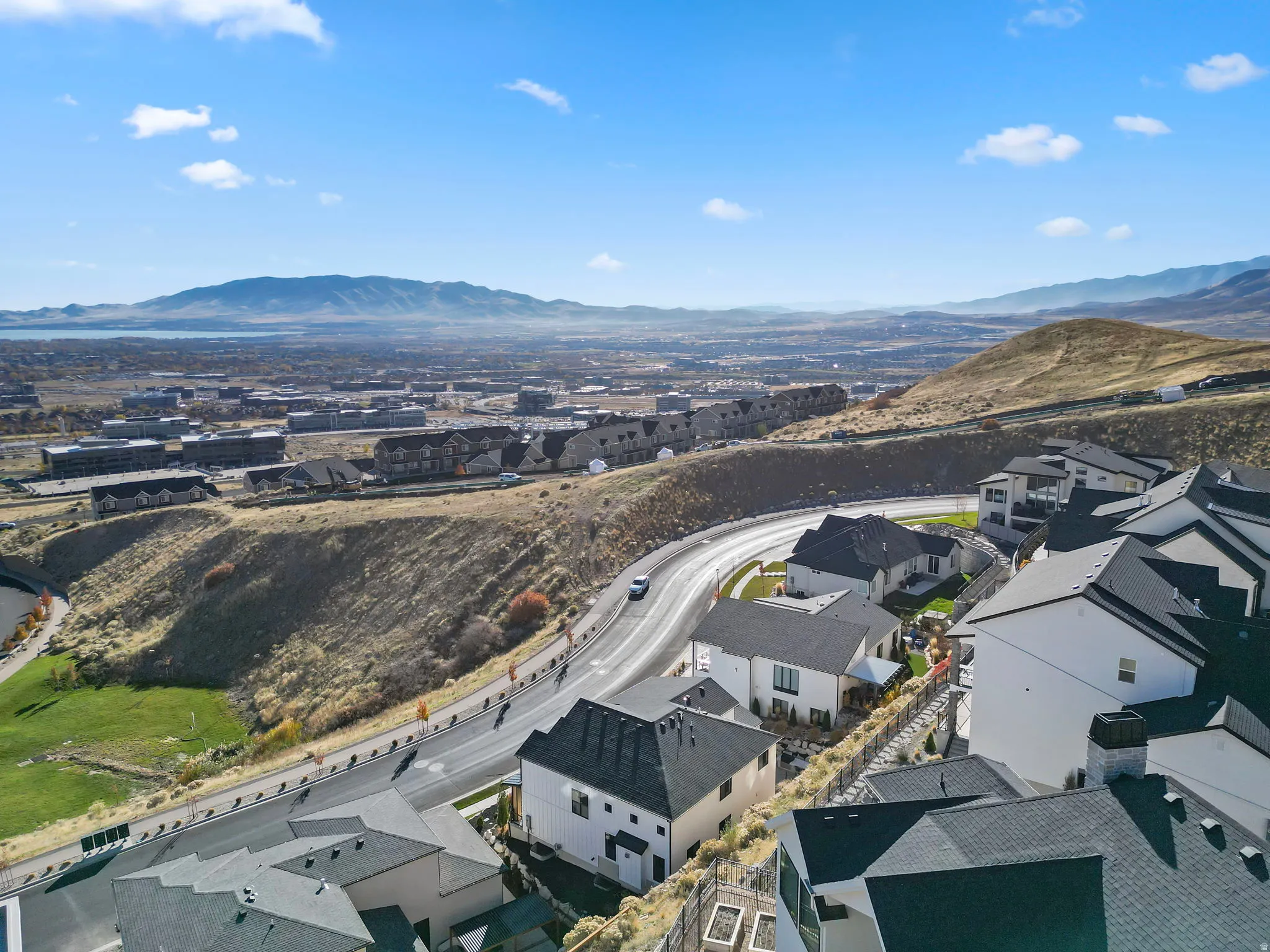 Aerial perspective of suburban area with mountains