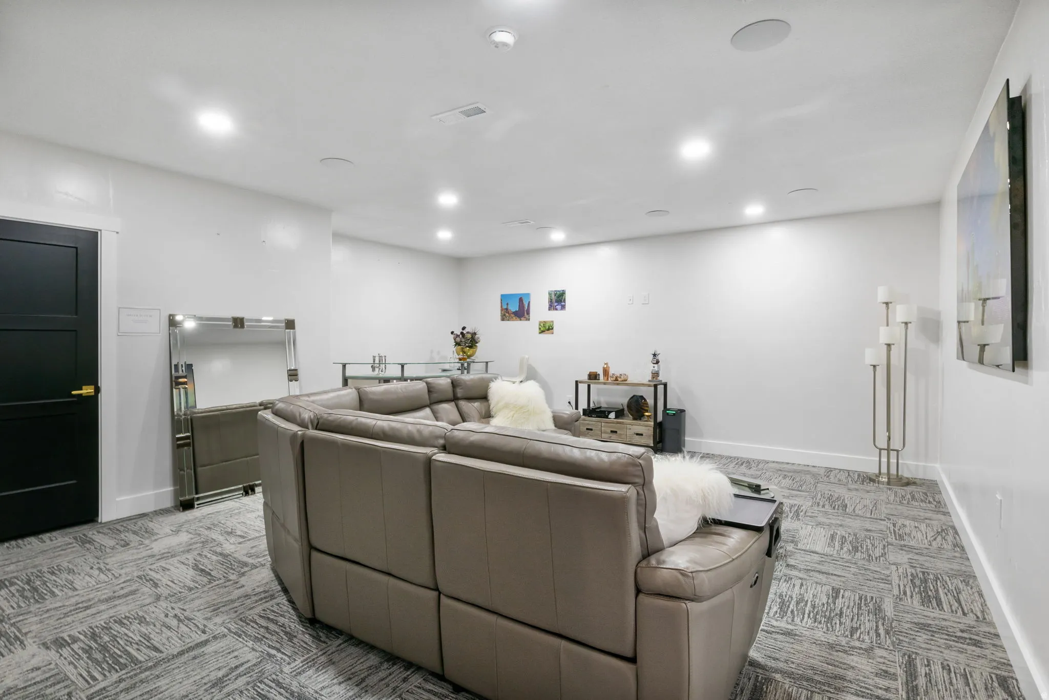 Living room featuring recessed lighting and light colored carpet