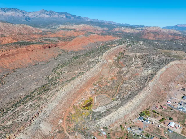 View of property location featuring a mountain backdrop and rural landscape