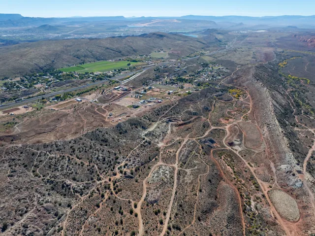 View of property location featuring a mountainous background and rural landscape