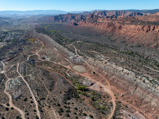 View of property location featuring a mountain backdrop and rural landscape