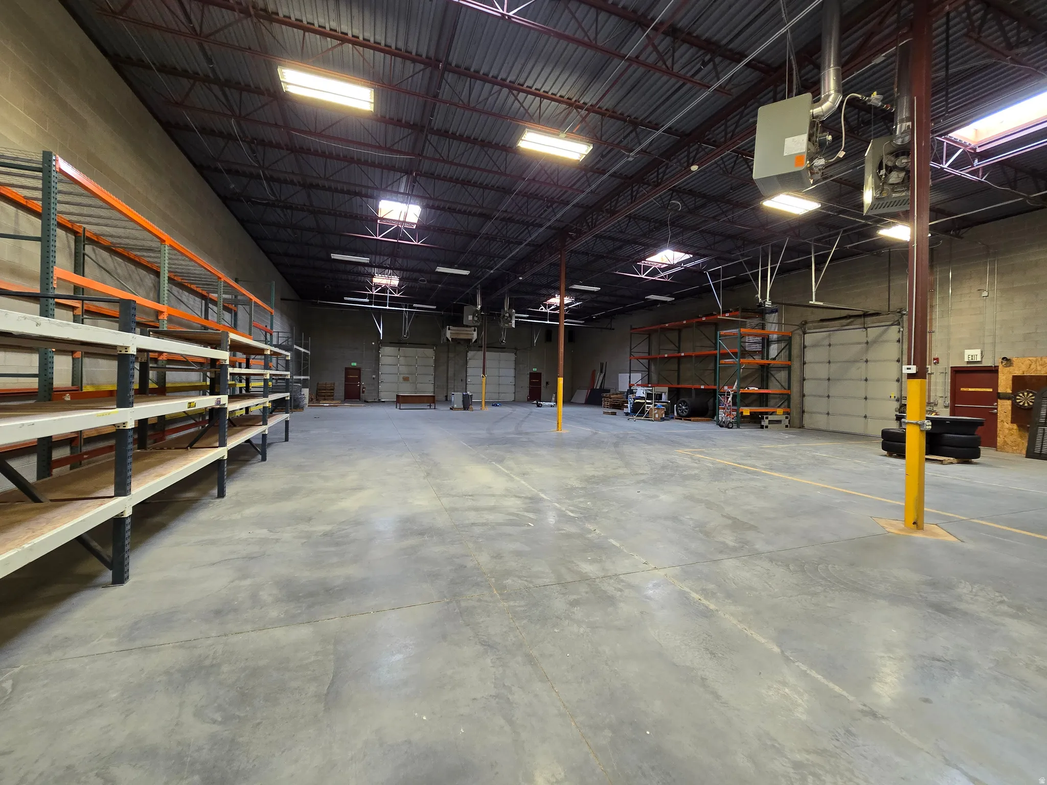 Garage featuring metal wall