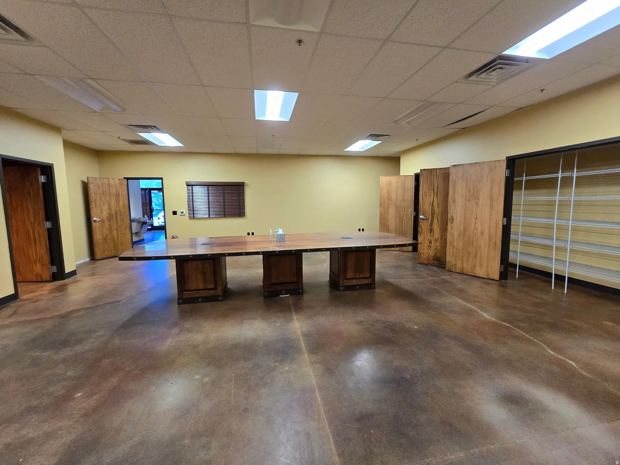 Unfurnished office featuring a paneled ceiling