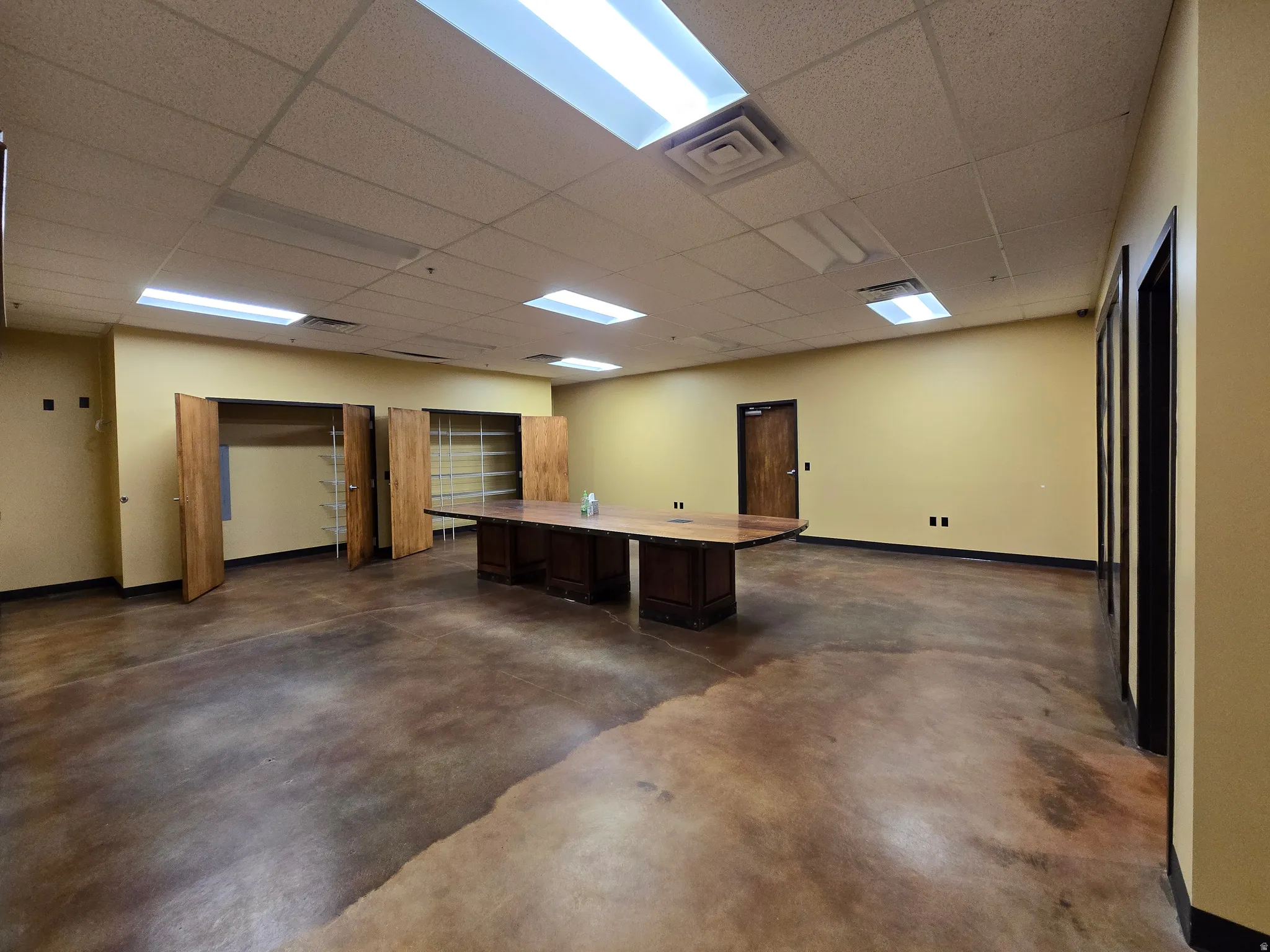 Unfurnished office featuring a paneled ceiling