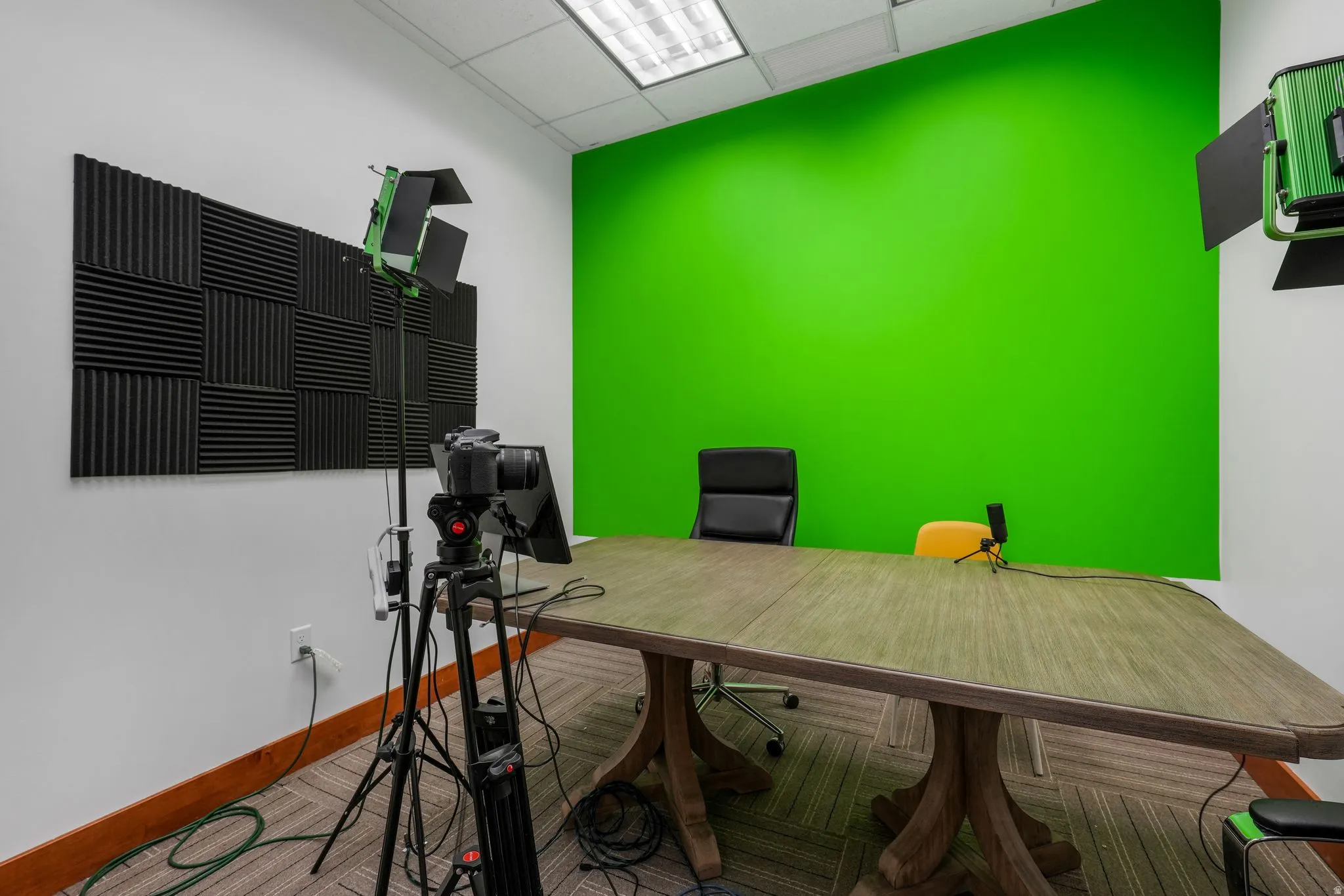 Office space featuring a paneled ceiling and baseboards