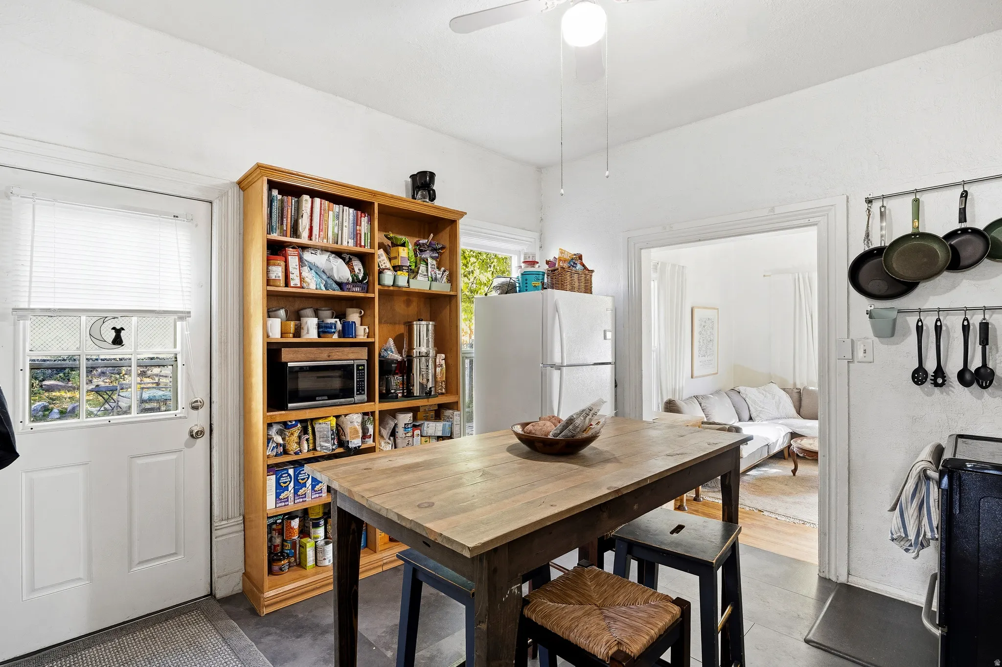 Dining room featuring ceiling fan