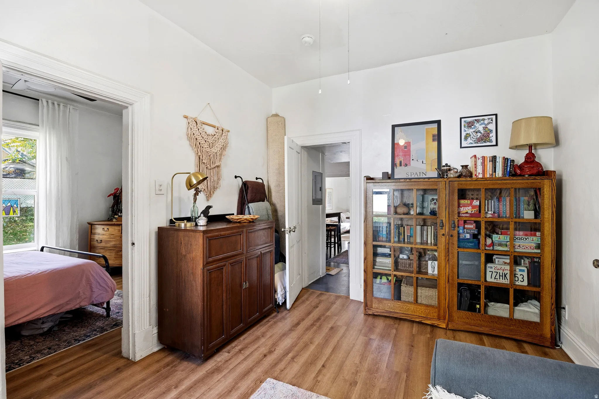 Bedroom with light wood-style floors