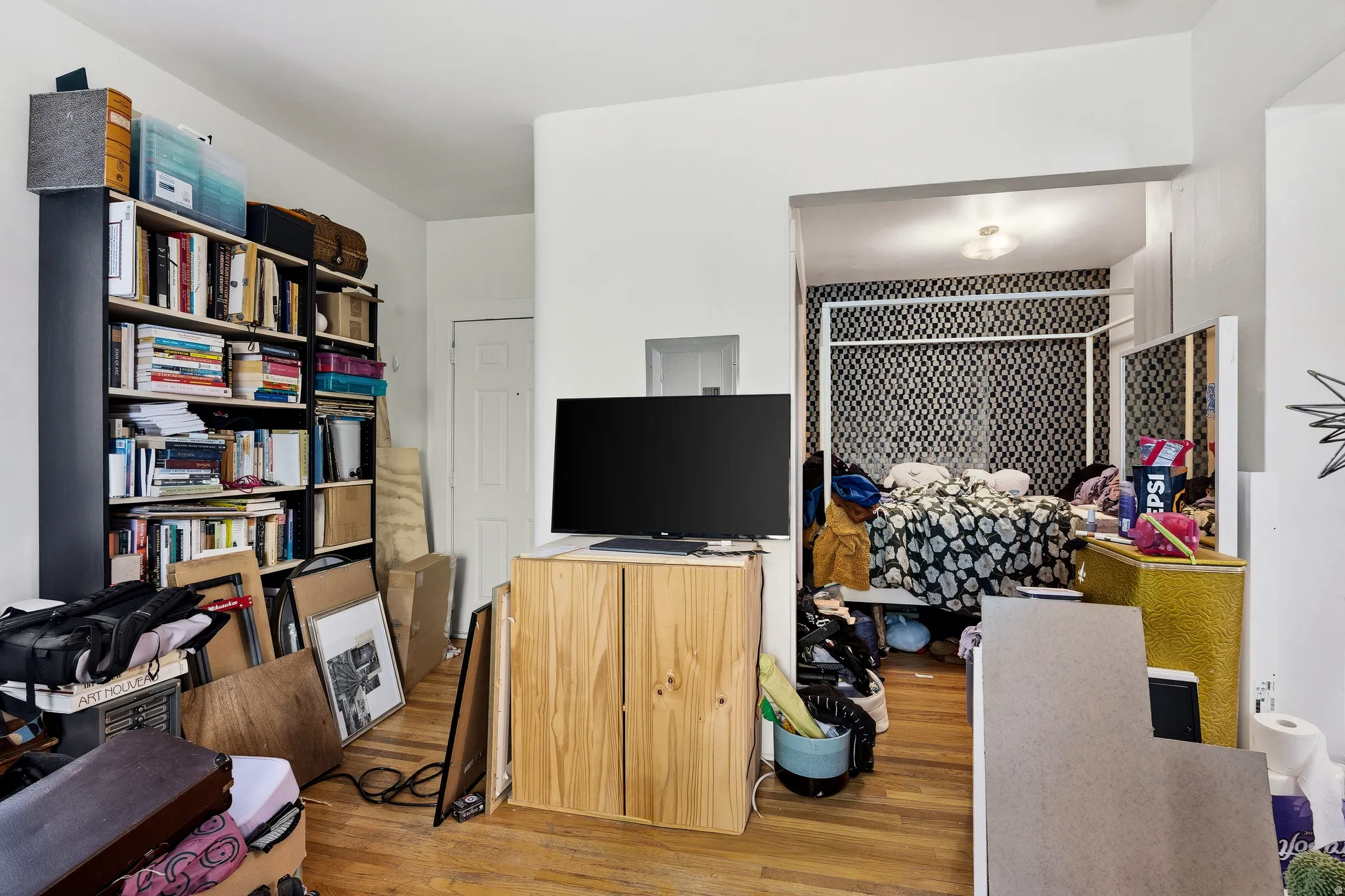 Home office with light wood-style floors