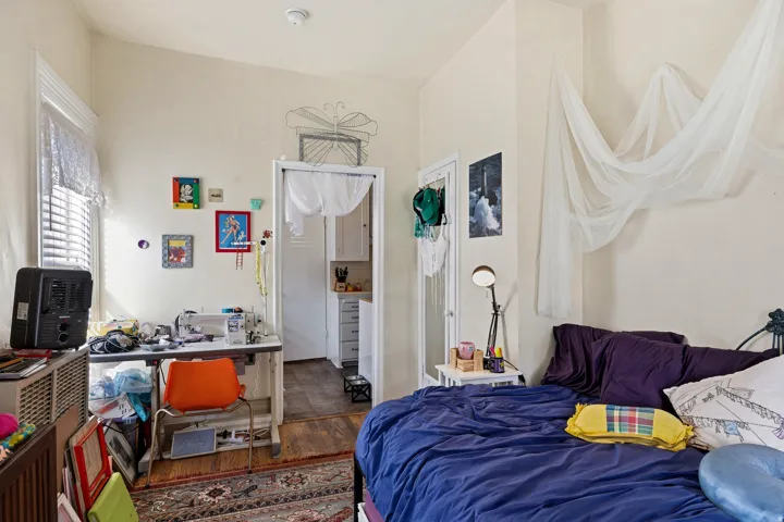 Bedroom featuring wood finished floors