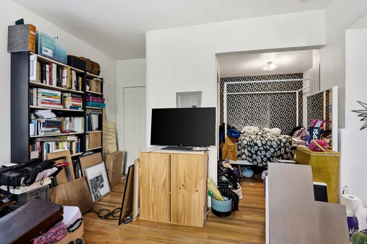 Home office with light wood-style floors
