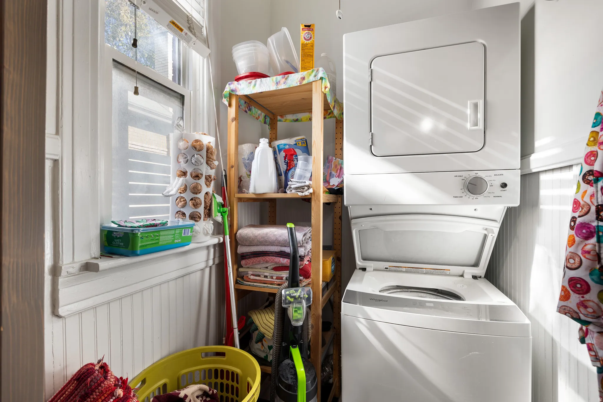 Laundry area with stacked washer / drying machine