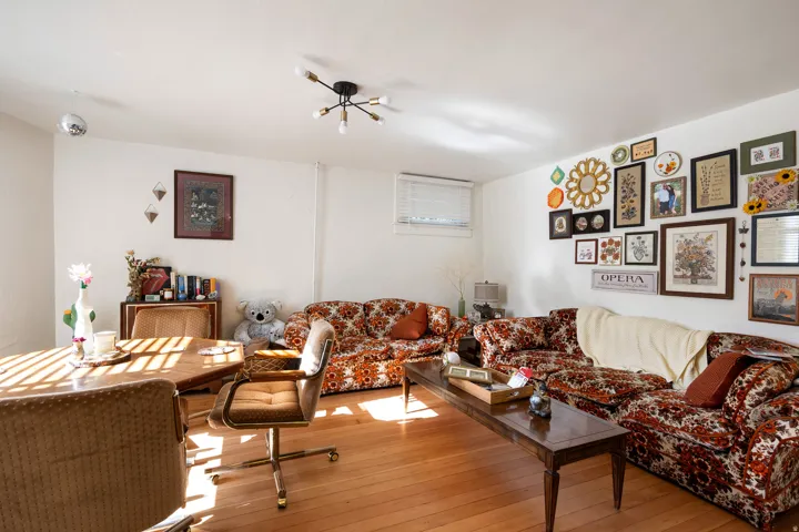 Living area featuring hardwood / wood-style floors