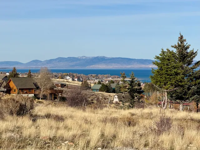 View of mountain background featuring a nearby body of water