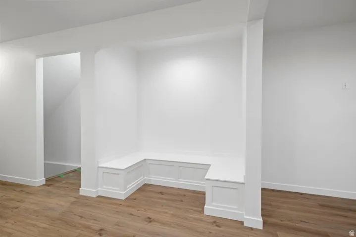 Mudroom with light wood-style flooring