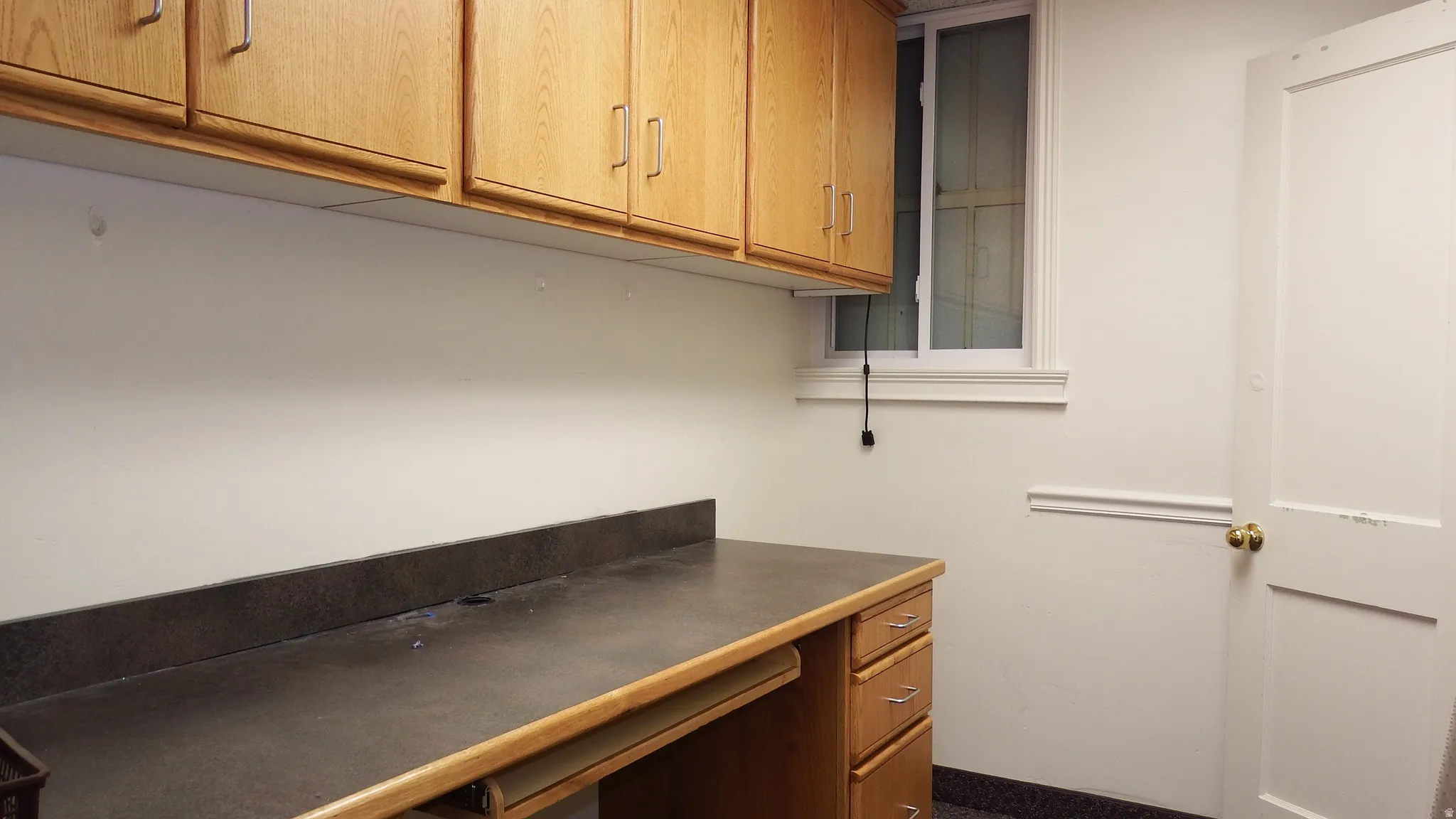 Unfurnished office with built in study area