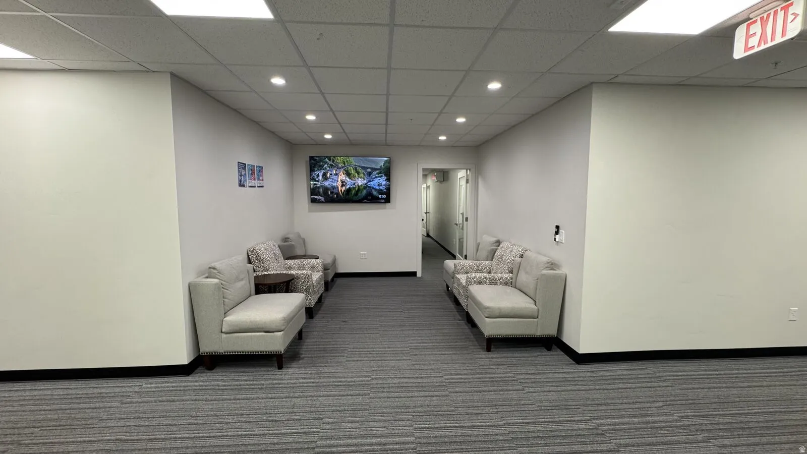 Lobby featuring recessed lighting and a drop ceiling