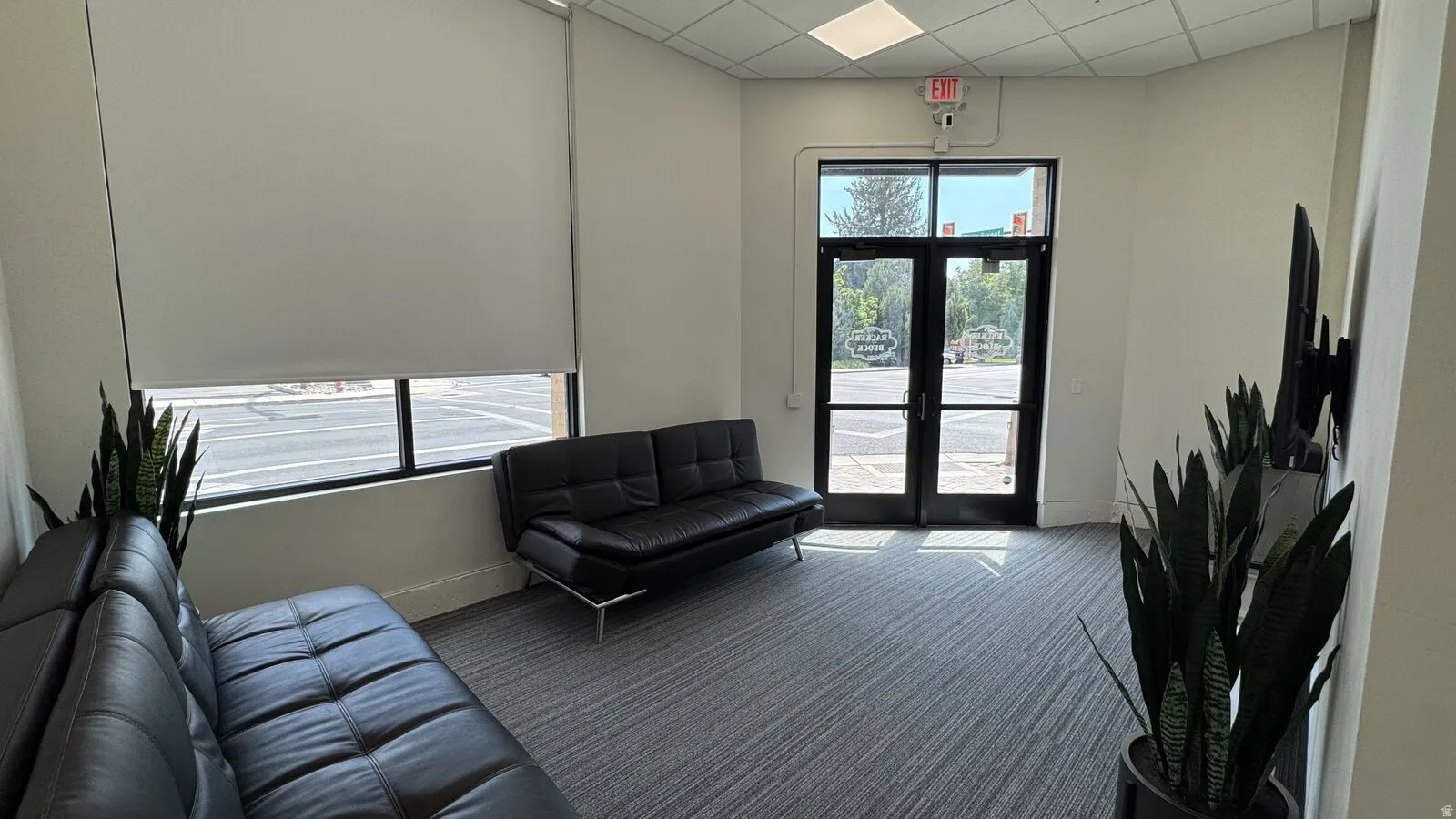 Building lobby with a paneled ceiling