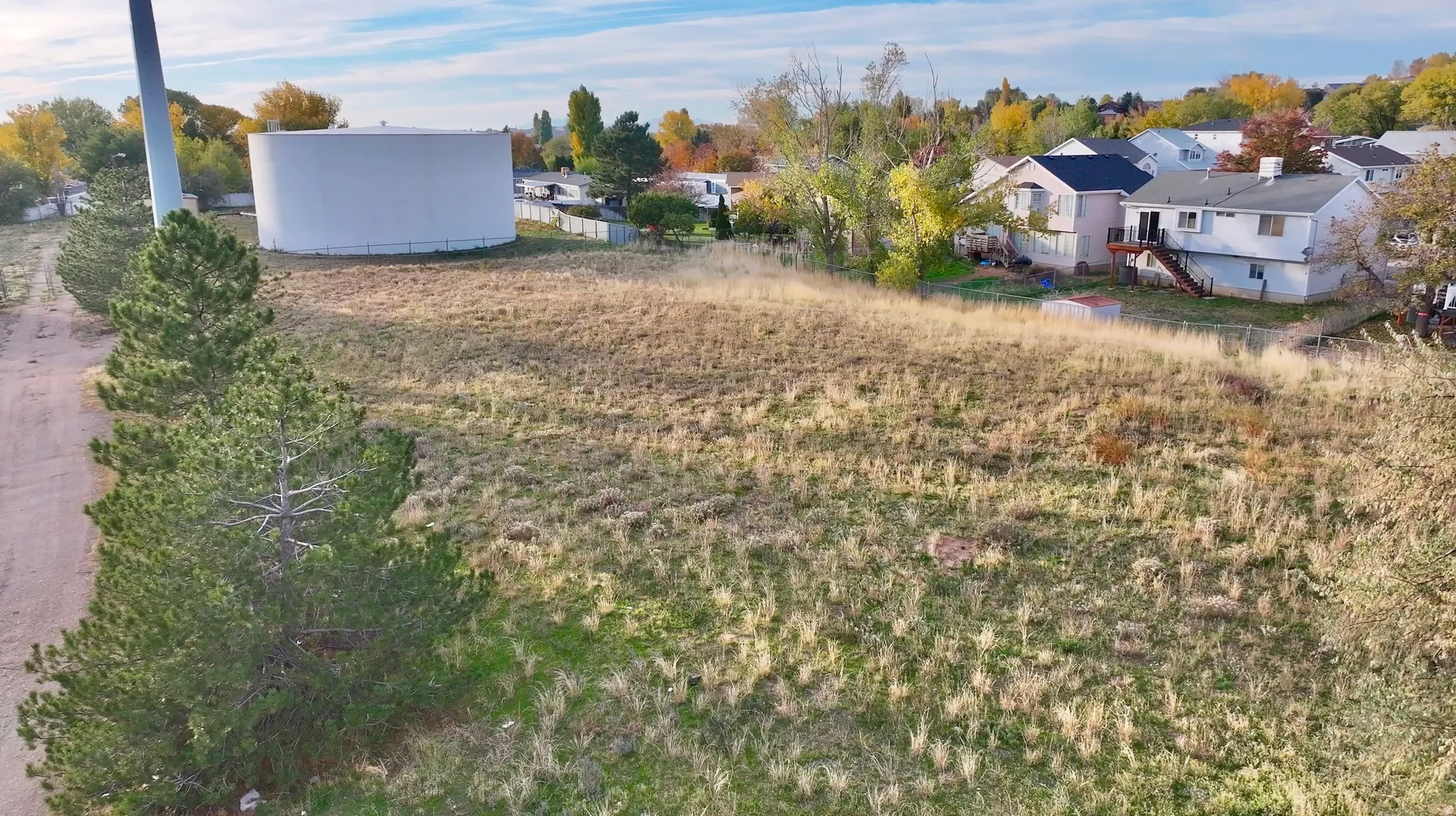 View of yard with stairs and a residential view