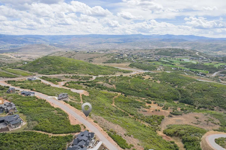 Drone / aerial view of a mountain backdrop