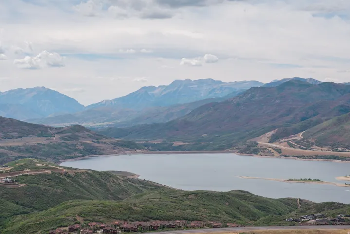 View of mountain backdrop with a large body of water
