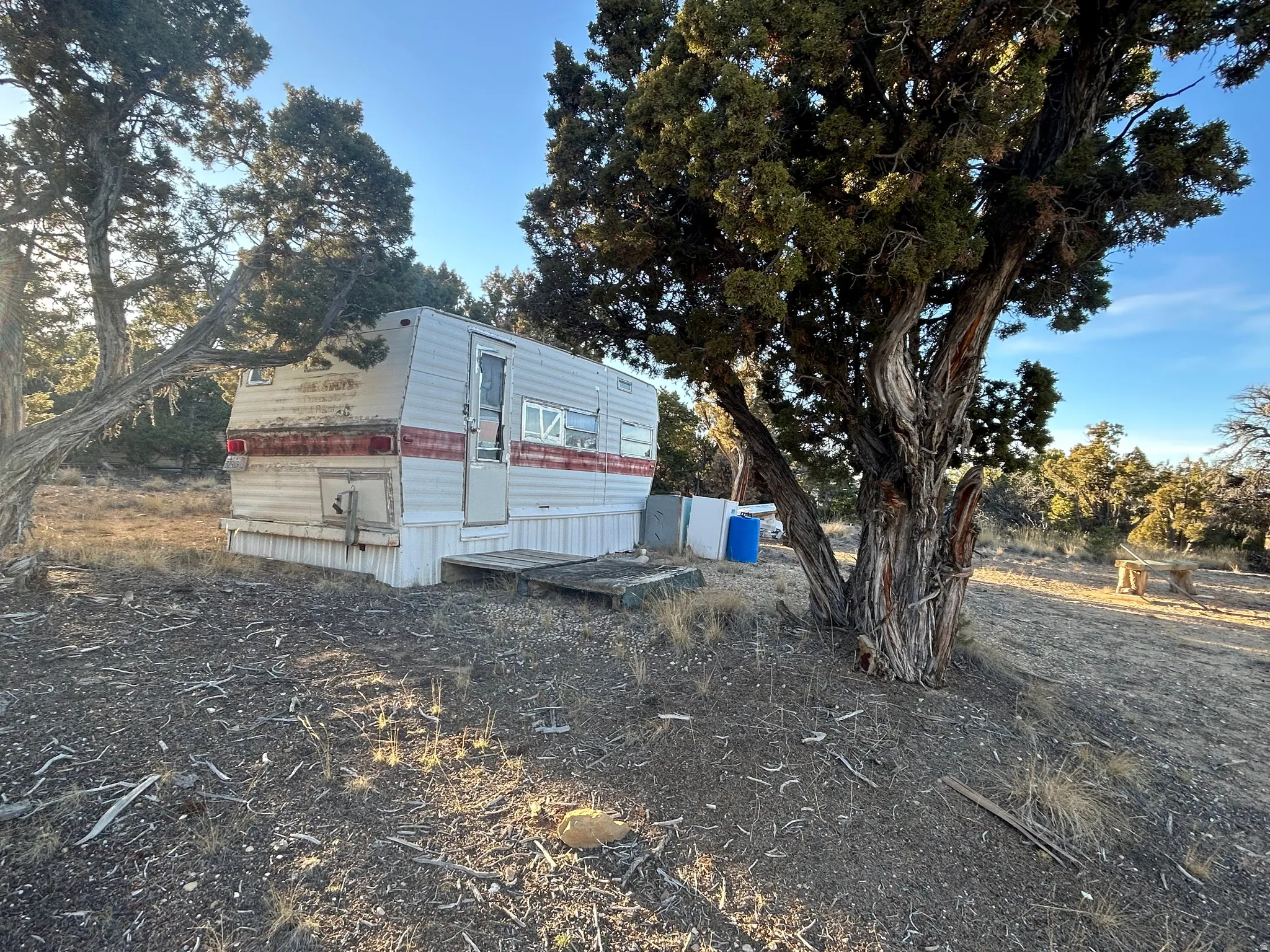 View of home's exterior featuring an outdoor structure