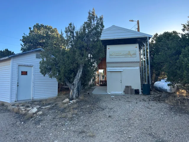 View of front facade with an outbuilding