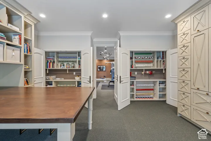 Office space featuring crown molding and recessed lighting