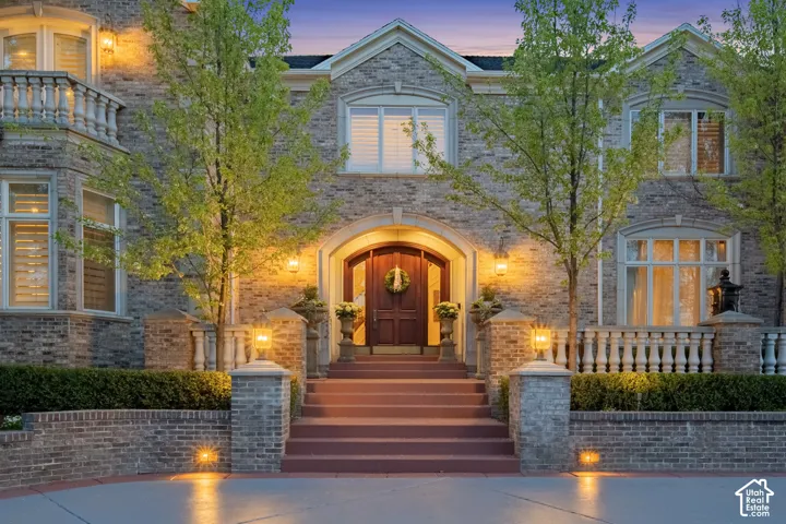 View of front of property with brick siding
