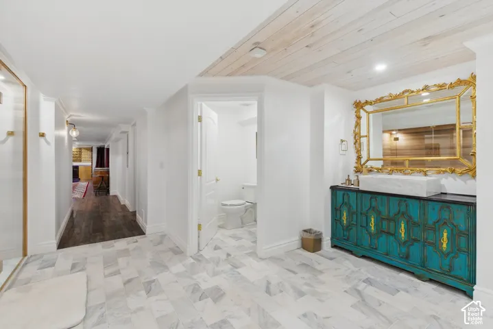 Hall featuring recessed lighting and wood ceiling