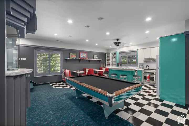 Recreation room featuring billiards and recessed lighting