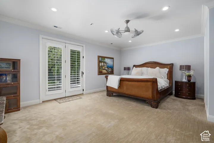 Bedroom featuring crown molding, access to outside, light colored carpet, recessed lighting, and ceiling fan