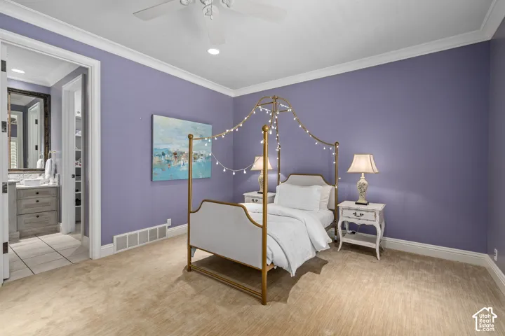 Bedroom with ornamental molding, carpet flooring, ceiling fan, and recessed lighting