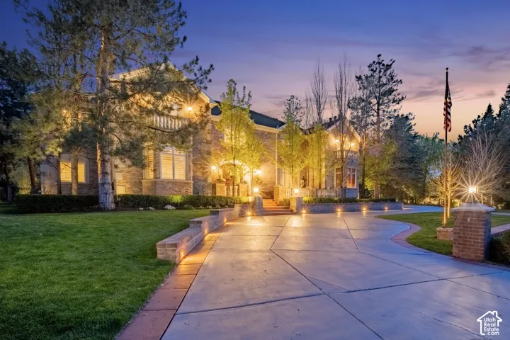 View of home's community featuring a lawn