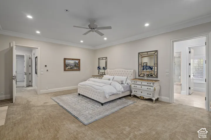Bedroom featuring ornamental molding, recessed lighting, light colored carpet, and ceiling fan