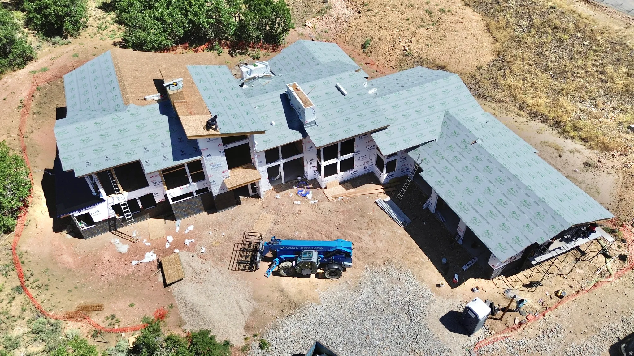 Contemporary architectural design featuring a multi-level roof structure with advanced underlayment