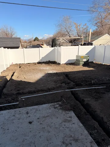 View of fenced backyard