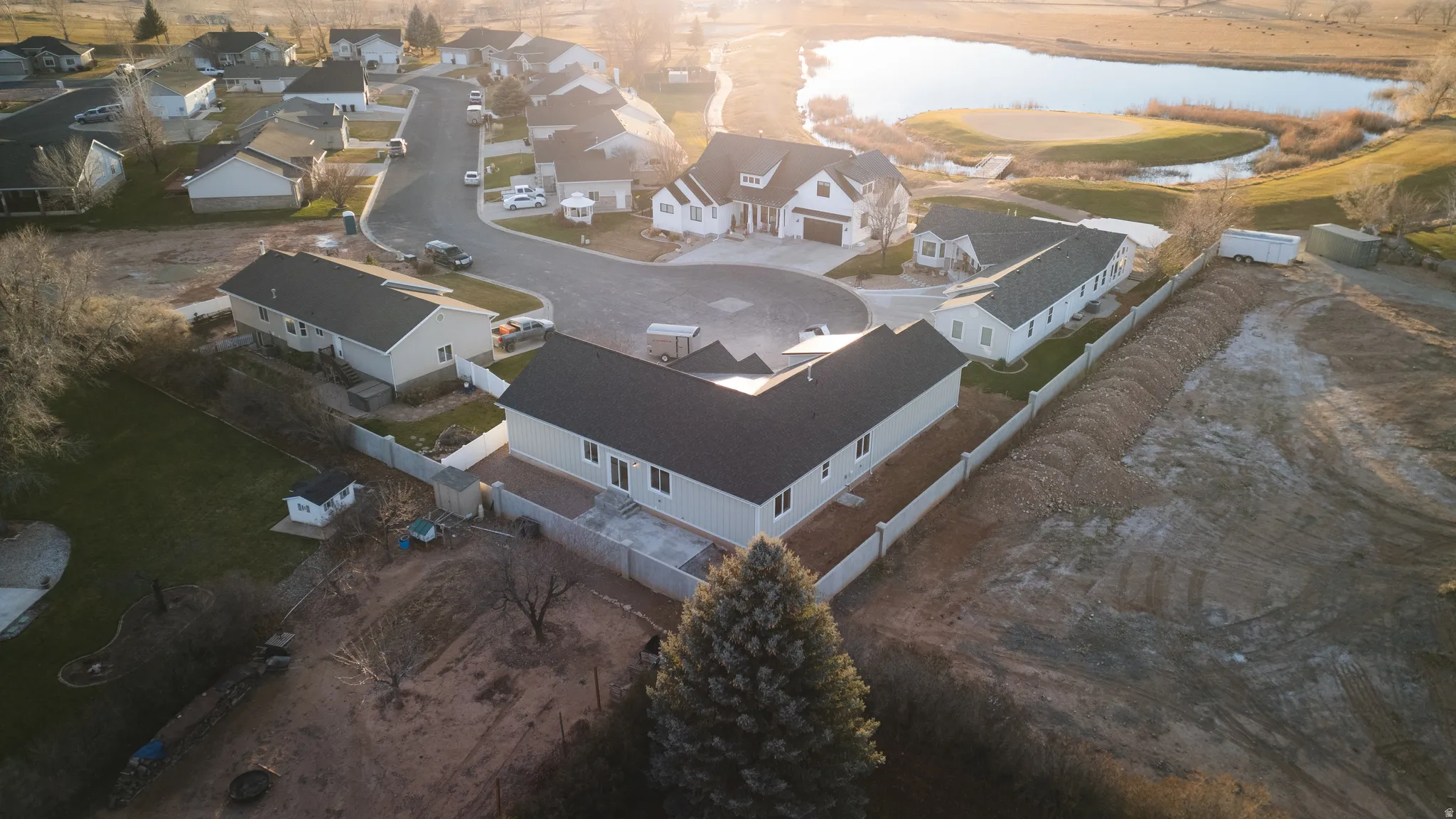 View of property location with nearby suburban area and a large body of water