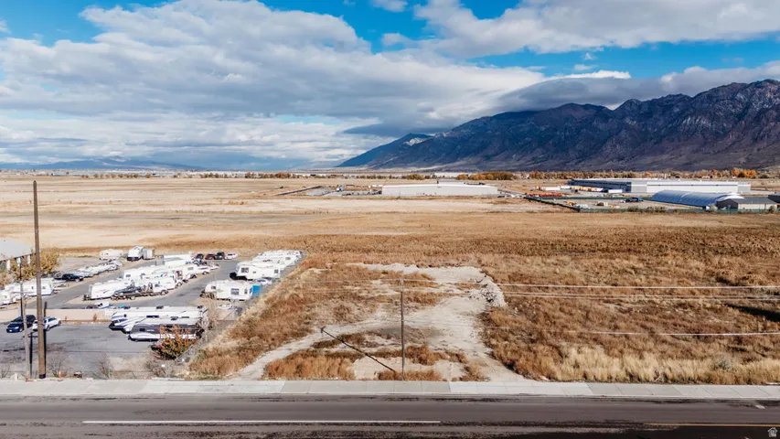View of mountain backdrop with industrial structures